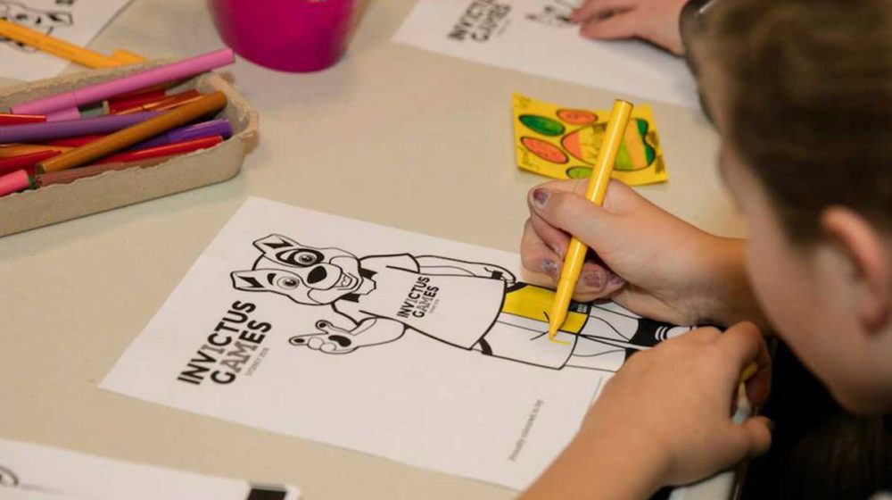 Children colouring in Mascot